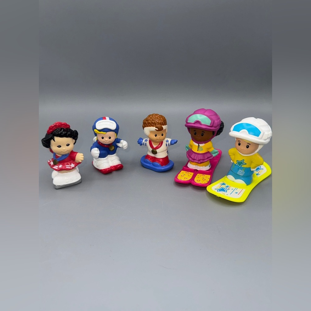 Little people Winter Olympics and snow skiers